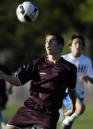 HHS_GHS_DSC5071b Forward Mitch Marinello focuses on the ball as it drops to his feet during the Tide's only loss of the first half of the season, 0-3 at cross-town rival Hillsboro.