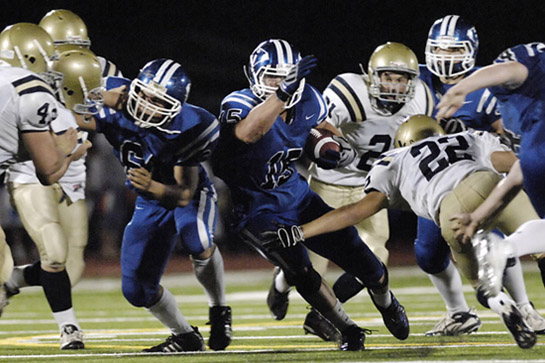 HHS_WAHS_DSC4566b Colt Lyerla of Hillsboro finds a hole in the line for a five yard gain during the Spartans final drive of the fourth quarter.