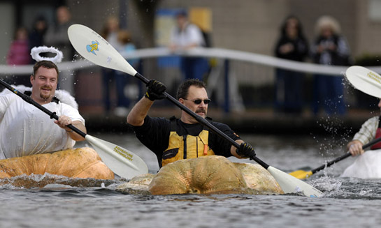 GPR09_DSC7516b Giant pumpkin grower Mel Gandee of Estacada, Oregon paddles his way towards the front of the pack in the early going of the growers' race during the West Coast Giant Pumpkin Regatta.