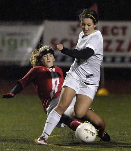 JSH_WHS_DSC9006b Kallie Neimann (left) of Westview picks up a fould for bringing down Jesuit's Alison Martin (right) with a tackle from behind late during the second half.