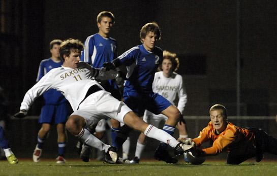 SSHS_SMHS_DSC4193b Cameron French lays out full stretch as he hits a first-time ball off a free kick from the edge of the box in an attempt to score. His shot was blocked by South Medford keeper Mitch North, however the ball rebounded to the back post where South Salem's Ethan Jones tucked it into the net for the game winning goal.